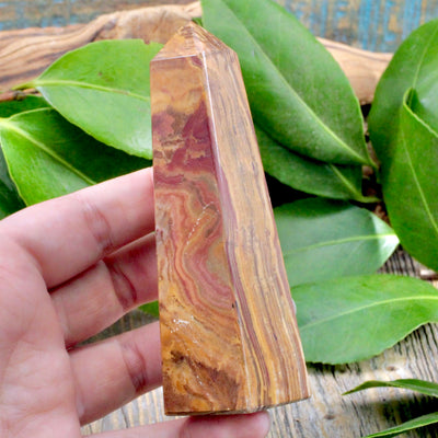 Banded Calcite Obelisk hand