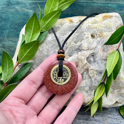 Friendship Goldstone Necklace 40mm hand